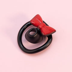 Black flat chastity ring set with glossy red bow