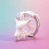 white dinosaur fossil skull resin chastity cage