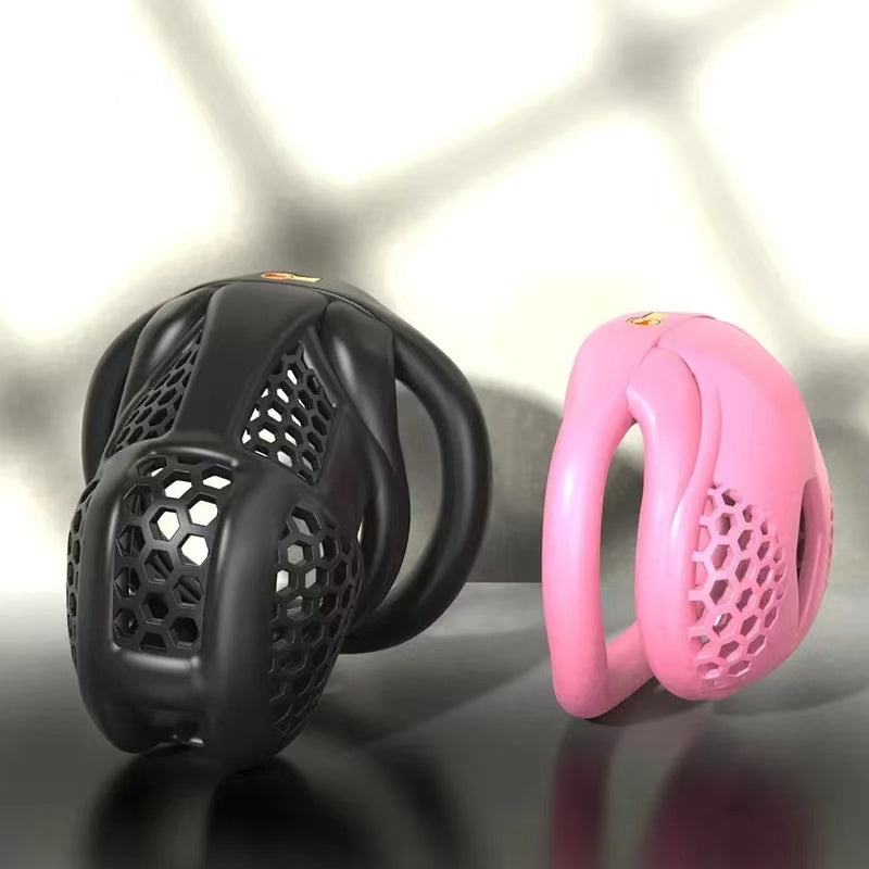 Black and pink honeycomb chastity cages displayed side by side