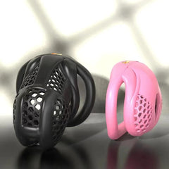 Black and pink honeycomb chastity cages displayed side by side