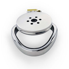 JTS S239 flat chastity cage with a curved base ring and perforated front plate, viewed at an angle