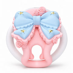 Front view of pink and blue 3D-printed bow cage
