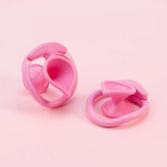 Pink teardrop ABS negative chastity locks in two profiles