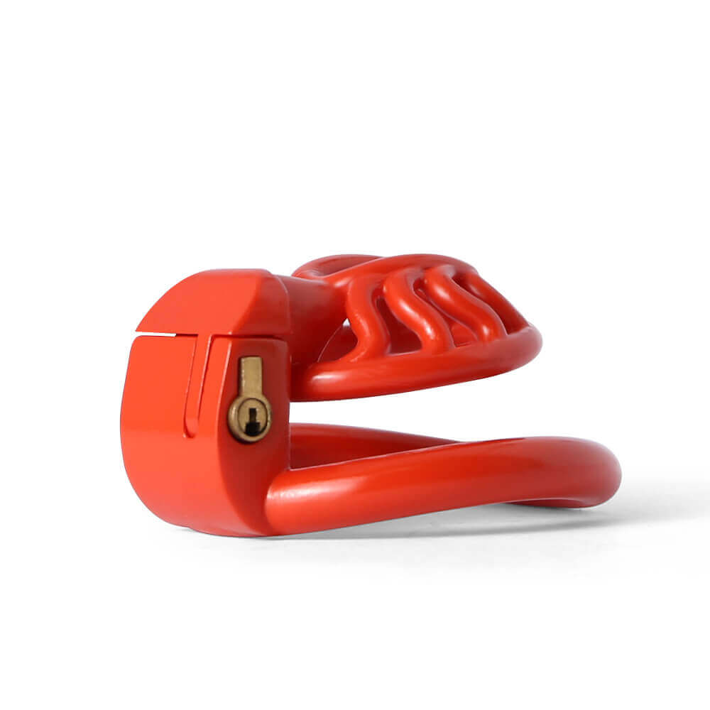 Low side view of the red Sun Spider chastity cage
