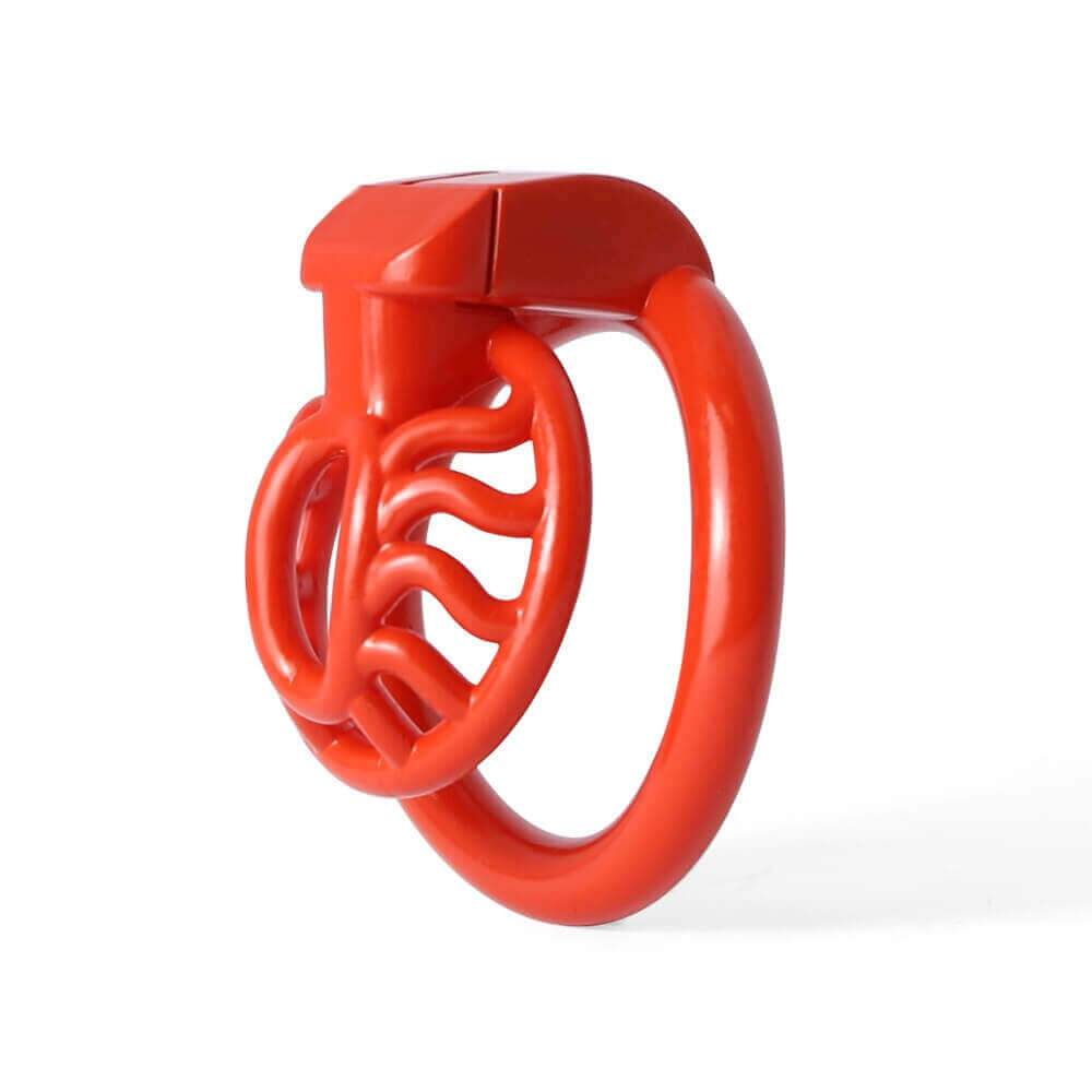 Red Sun Spider chastity cage in front three-quarter view
