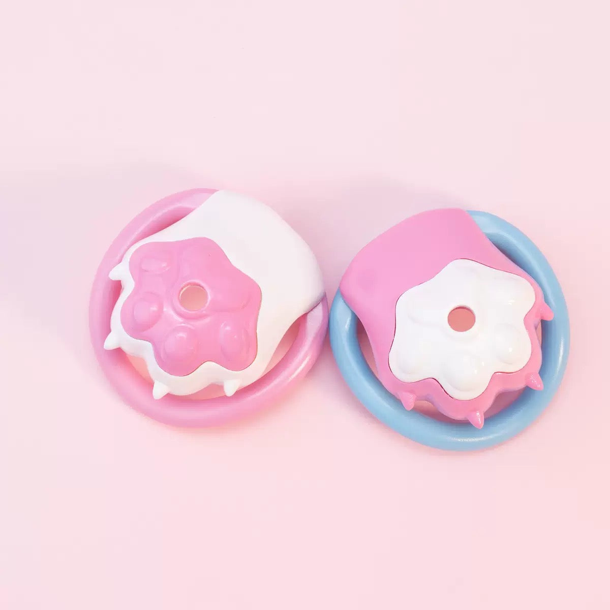 Pink and white cat paw locks with pink and blue rings