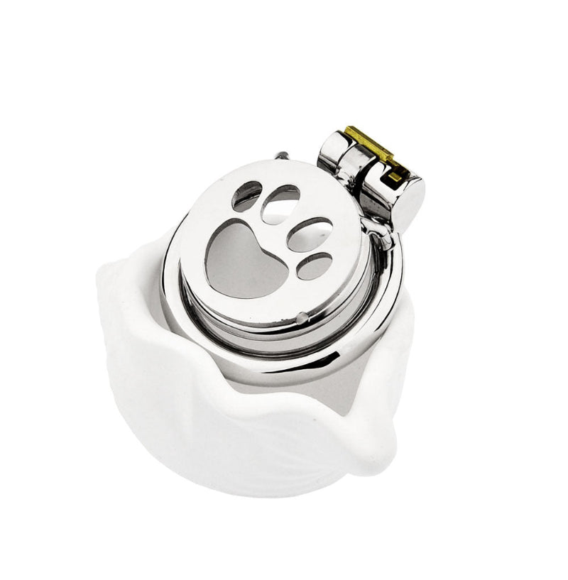 Cat’s Paw flat chastity cage shown in hand for scale