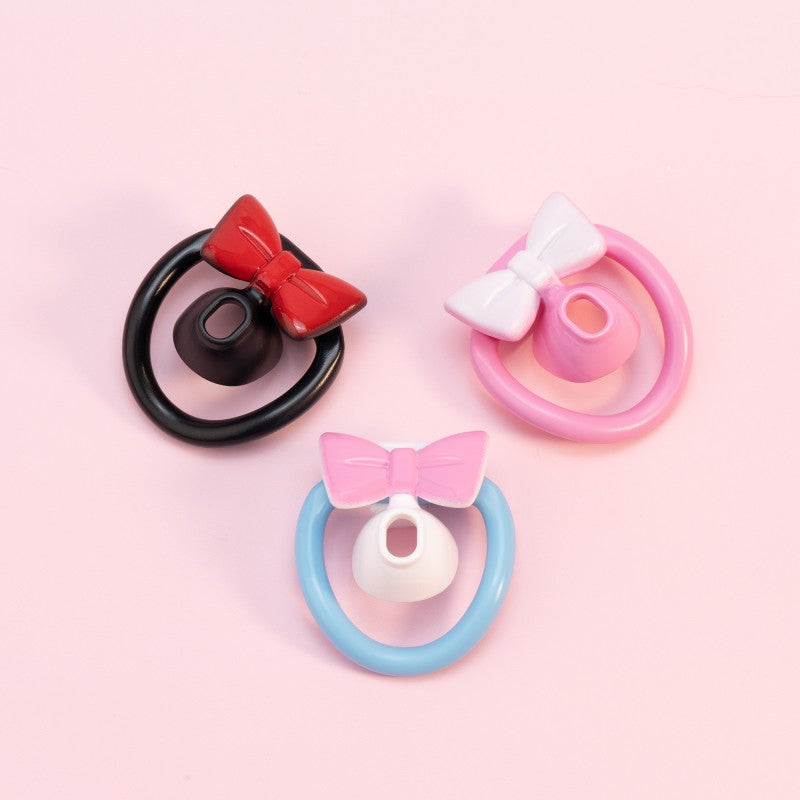Cute bow chastity ring sets arranged in three color combinations