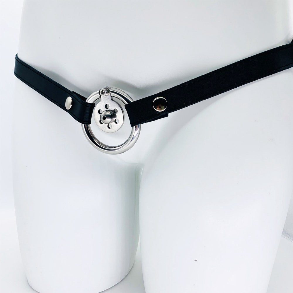 JTS S235 flat cage with waist strap and metal urethral tube on a mannequin
