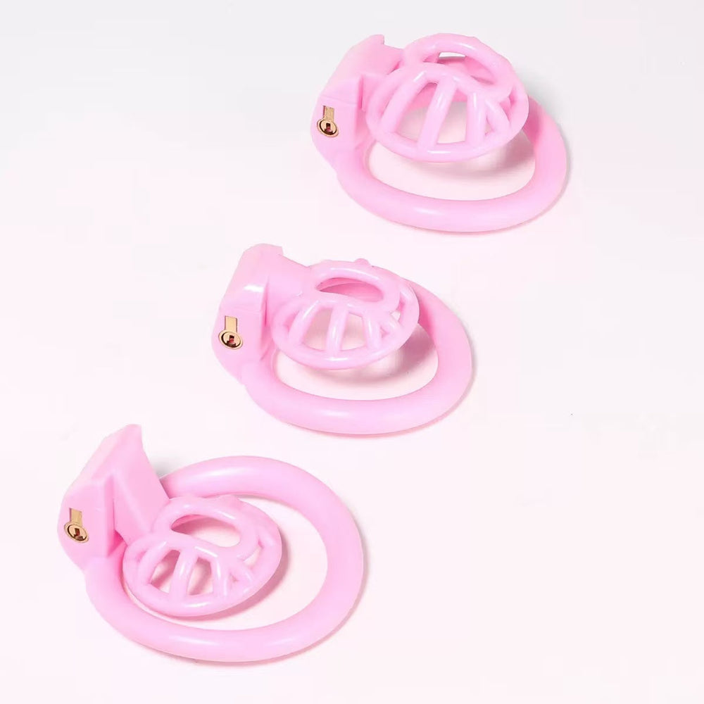 Pink LK-157 inverted resin chastity cage size comparison