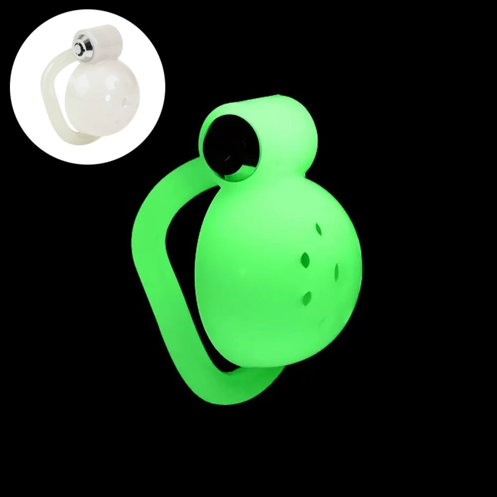 Domed ABS cage glowing green with an inset showing its white daytime appearance
