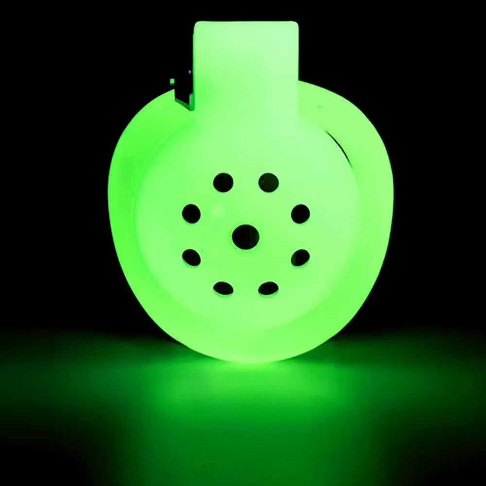 Front view of a green glowing ABS flat disc with circular perforations
