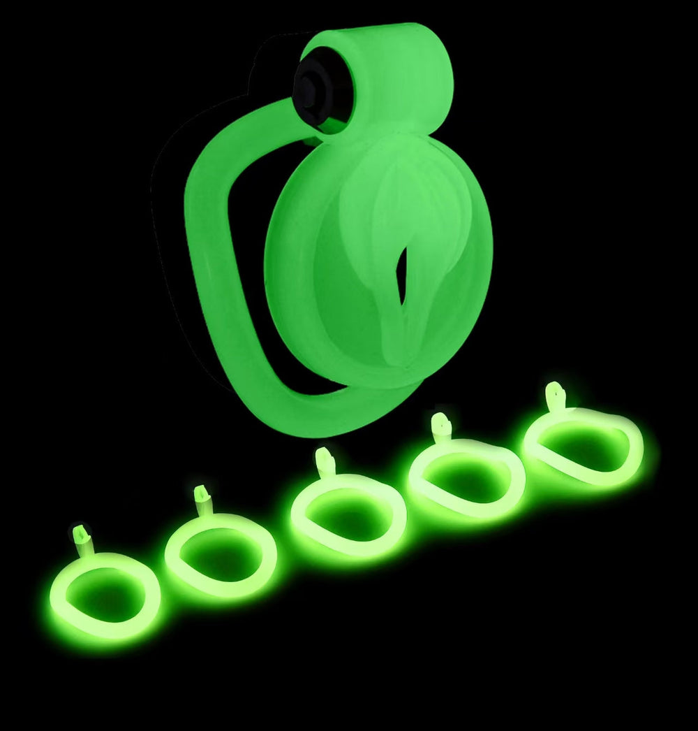 Green glowing Pussy B ABS cage displayed with five base rings

