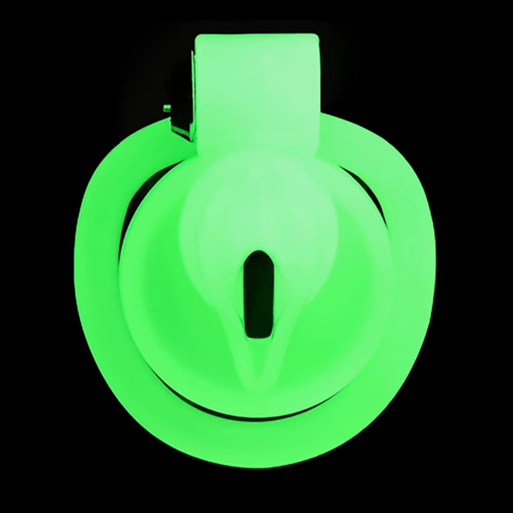 Front view of the green glowing Pussy B cage with its central opening
