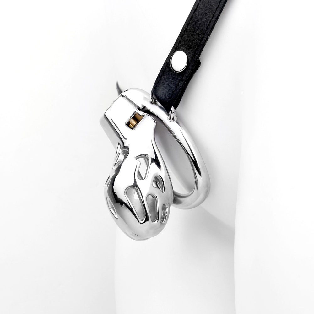 Angled view of the stainless steel Cobra cage connected to the black support belt on a display form
