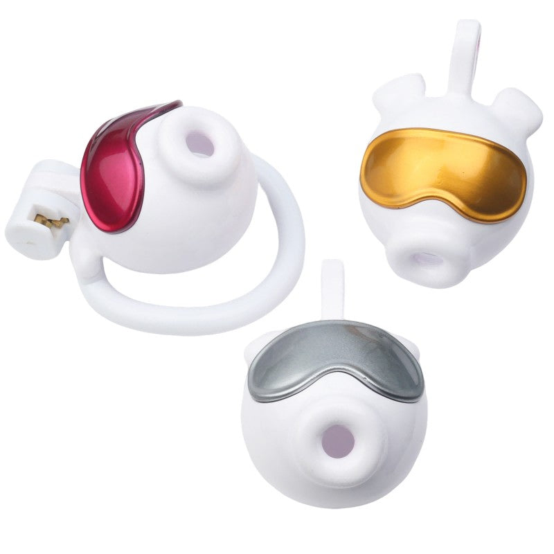 White octopus goggle chastity cages in red, gold and silver