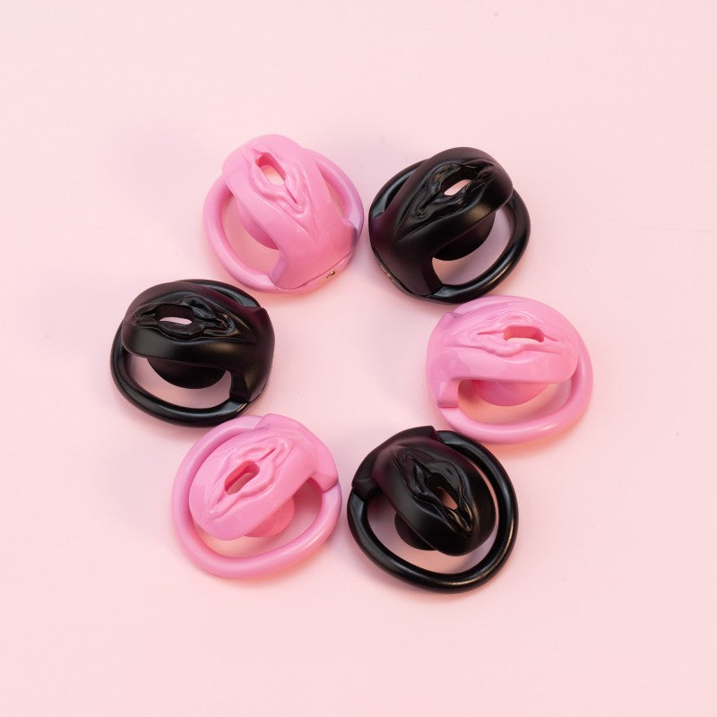 Pink and black vulva-shaped cages in three depth options
