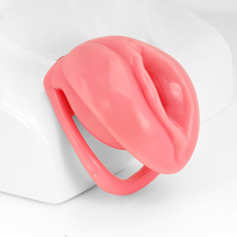 Pink faux labia silicone chastity cage with resin inner cage