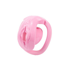 Pink vulva-shaped flat chastity cage side view