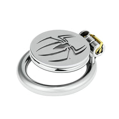 Angled view of spider-emblem flat stainless steel chastity cage