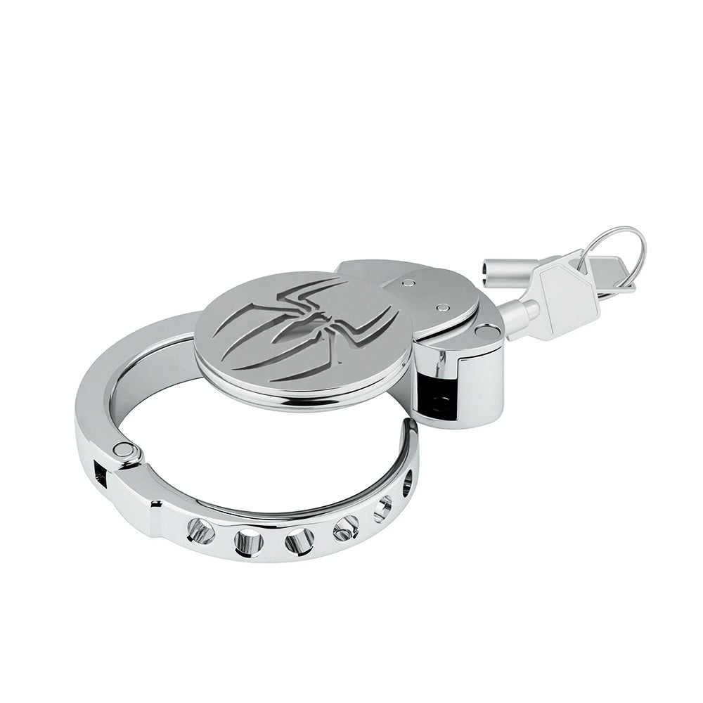 Angled view of spider-emblem metal chastity cage ZC-199