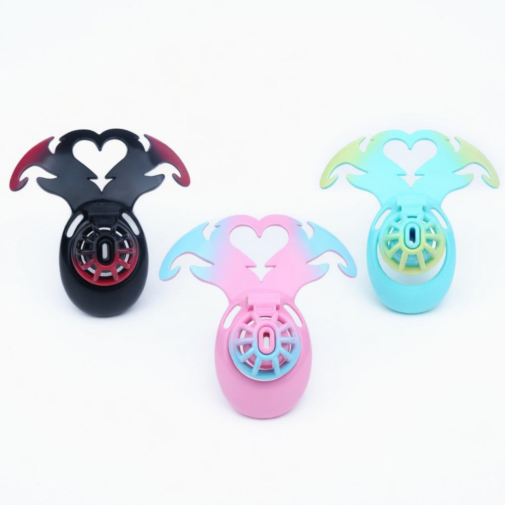 Succubus Heart chastity cages in black, pink and blue